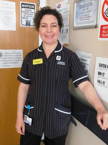 Clinical Matron Courtney Bickerdike wearing her #hellomynameis yellow badge