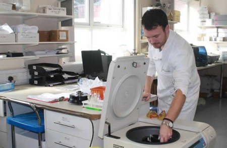 A staff member at work in the Biochemistry department at Blackpool Victoria Hospital