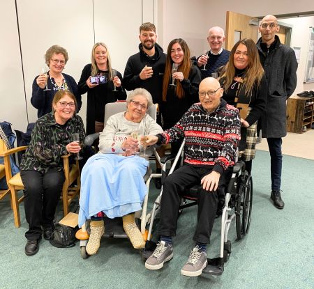 Family group share a toast.jpg